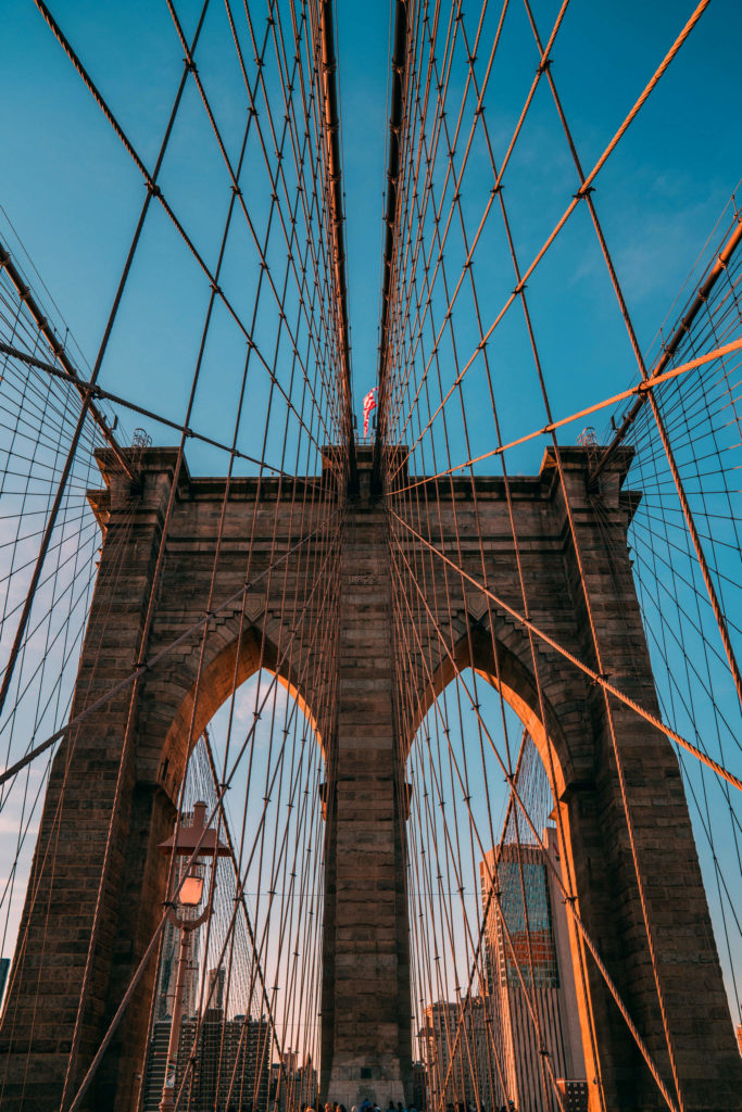A view of the brooklyn bridge from below.